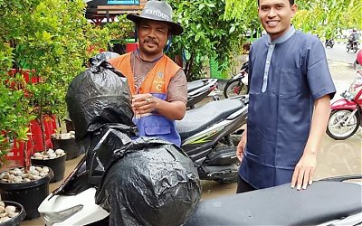 Juru Parkir Yang Kaya Hati