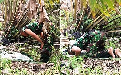 Viral, TNI Ini Shalat Hanya Beralas Daun Sawit Saat Jalankan Tugas