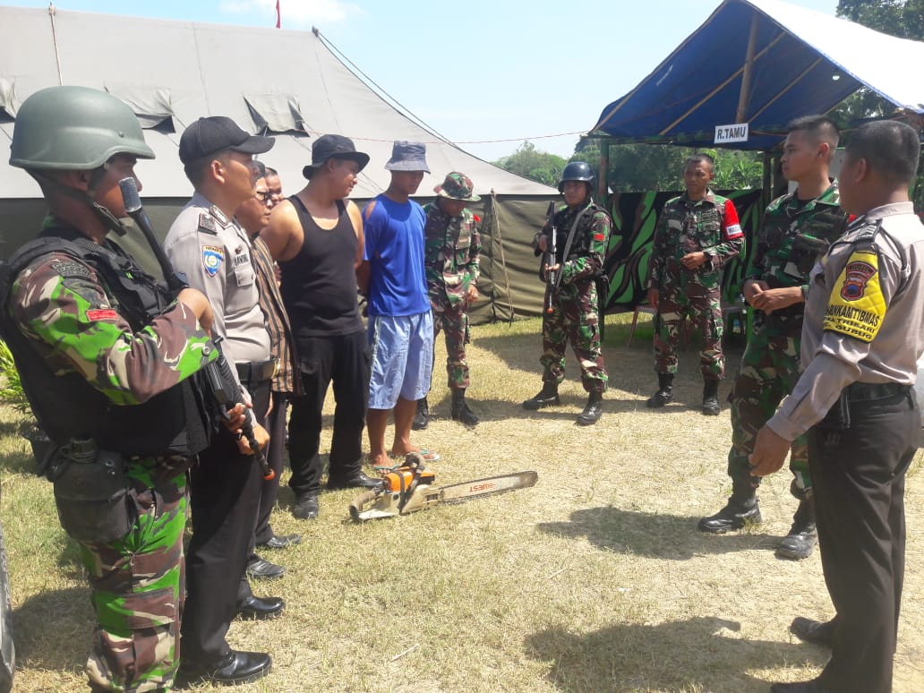 Yonif Mekanis Raider 411 Kostrad Amankan Pelaku llegal Logging