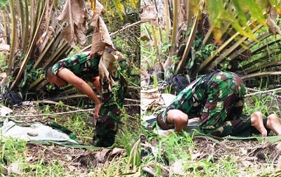 Viral, TNI Ini Shalat Hanya Beralas Daun Sawit Saat Jalankan Tugas